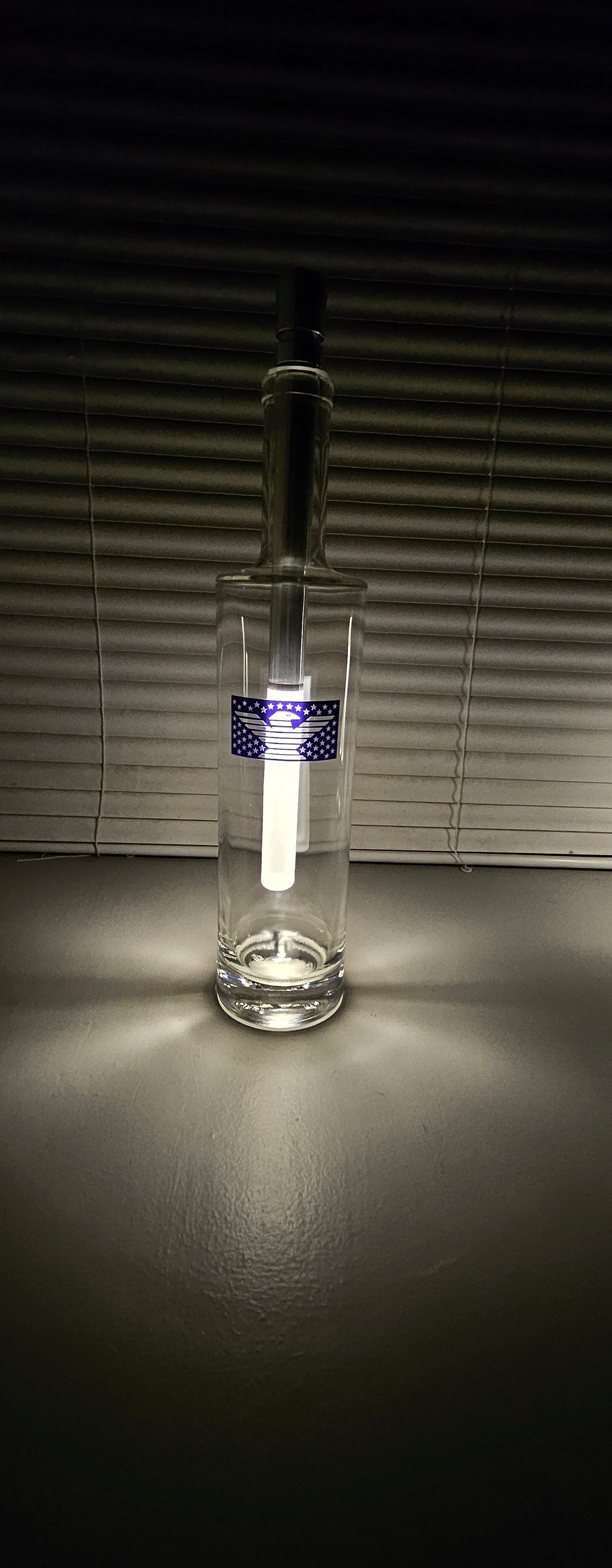 Clear bottle with American Eagle